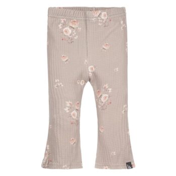 Babystylingin ihanat leveälaheiset housut tytölle, sävyssä light.