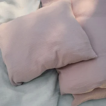 TISU ihana pussilakanasetti vauvalle, sävyssä vaalean punainen.