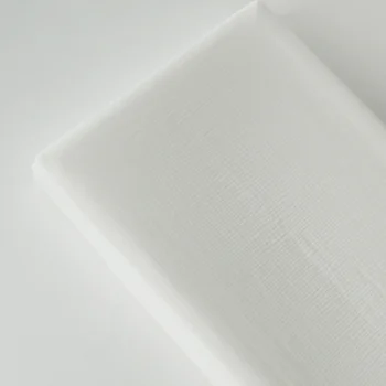 Vauvan hoitoalustan päällinen, sävyssä valkoinen.