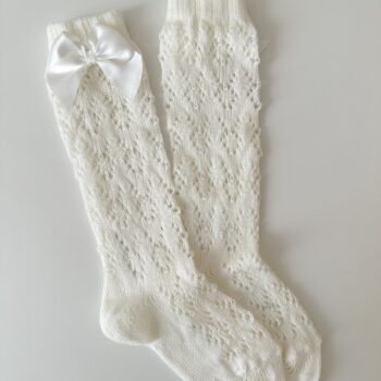 Cóndor sivupitsilliset polvisukat rusetilla, sävy luonnonvalkoinen